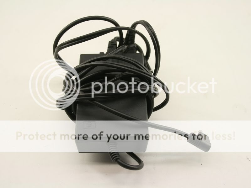 Geniune used HP 0950 2435 AC Adapter 10.6V 1.32A  